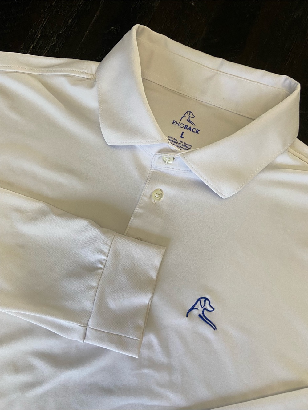 Rhoback White Long Sleeve Performance Polo with Blue Logo